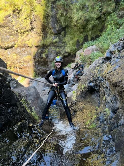 Go Explore Canyoning Level 2 (Nun's Valley) . - Abseil action in the 10 to 15 meter range