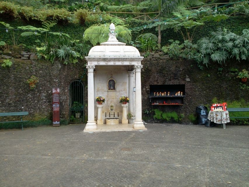 Madeira: Monte Sightseeing Tour & Toboggan Sled Ride - Entering Monte: A hillside walk with clear purpose